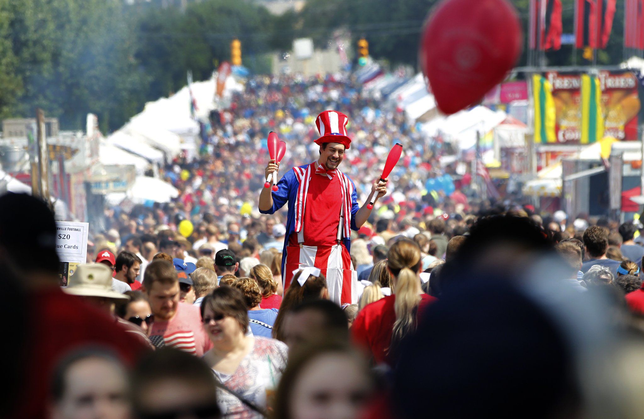 street fair performer at the centerville-washington township americana festival
