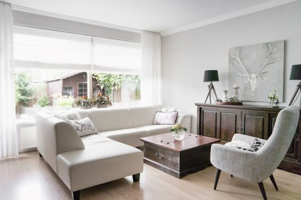 Living room with neutral paint colors on the wall.