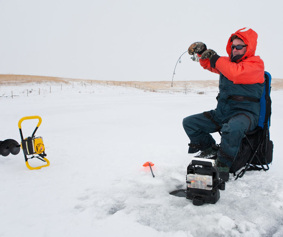 Man ice fishing at Five Rivers MetroParks.