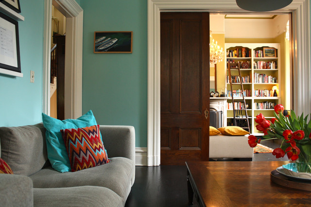 A home with pocket doors to create a privacy option for the connected library room.