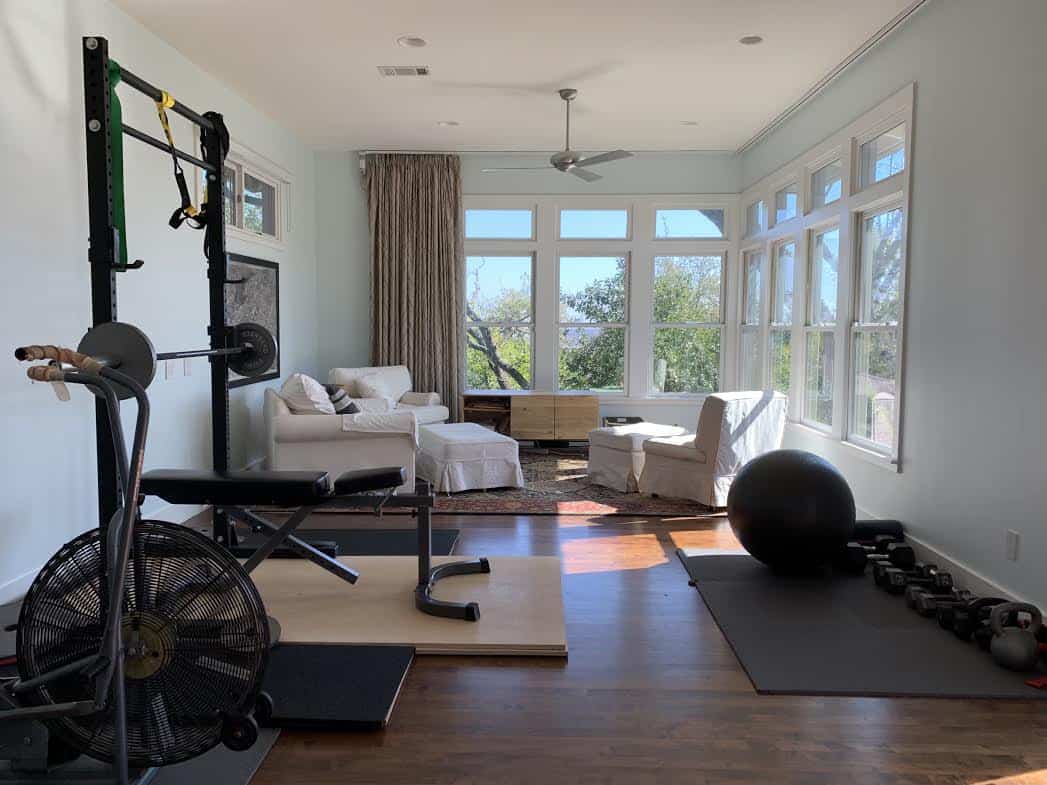 Room designed for multipurpose living (sitting room and home gym).