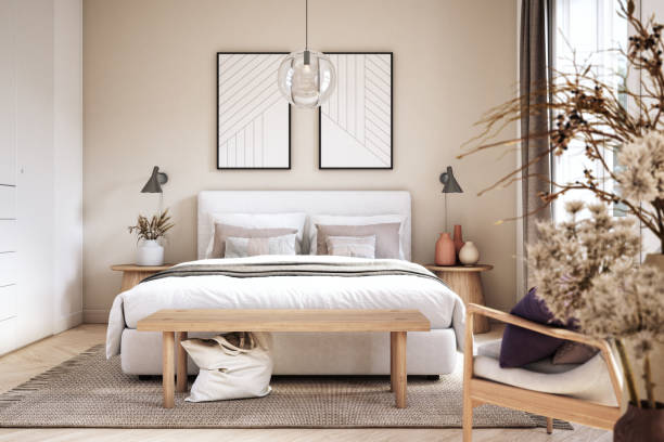 Bedroom with beige paint and cream decor accents