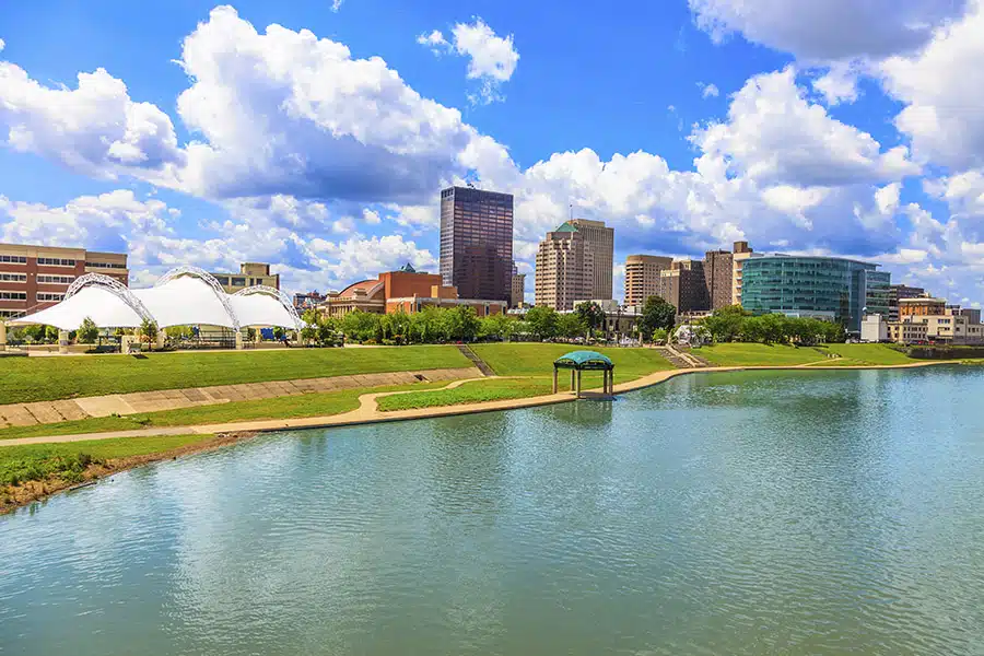 The Dayton, Ohio skyline during the day, as seen from the Great Miami River.
