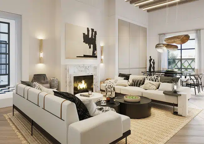 Tonal white paint on a living room wall gives the space an open, luxurious feel. 