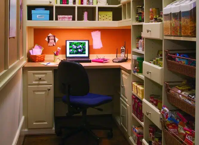 Walk-in pantry with a built-in office setup for multifunctionality